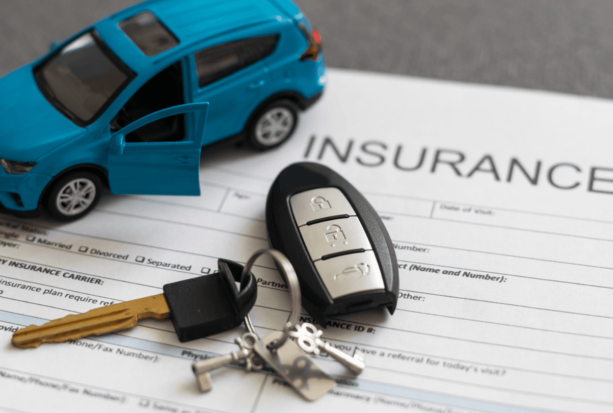 A sleek, modern car on a scenic road, representing reliable car insurance services in Powell, Ohio from Insurance Company Powell LLC.